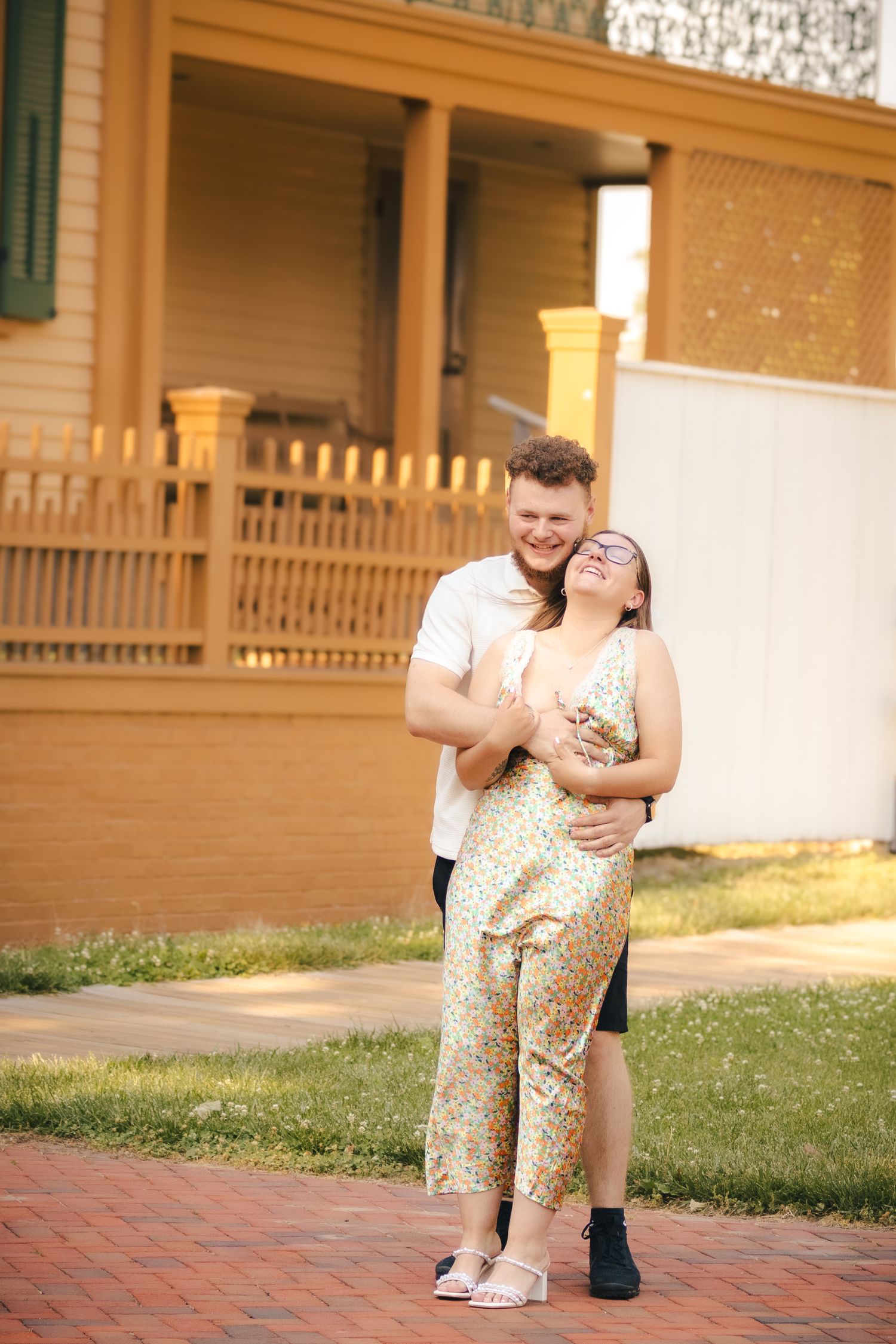 Outdoor summer engagement photos in downtown in Springfield, Illinois