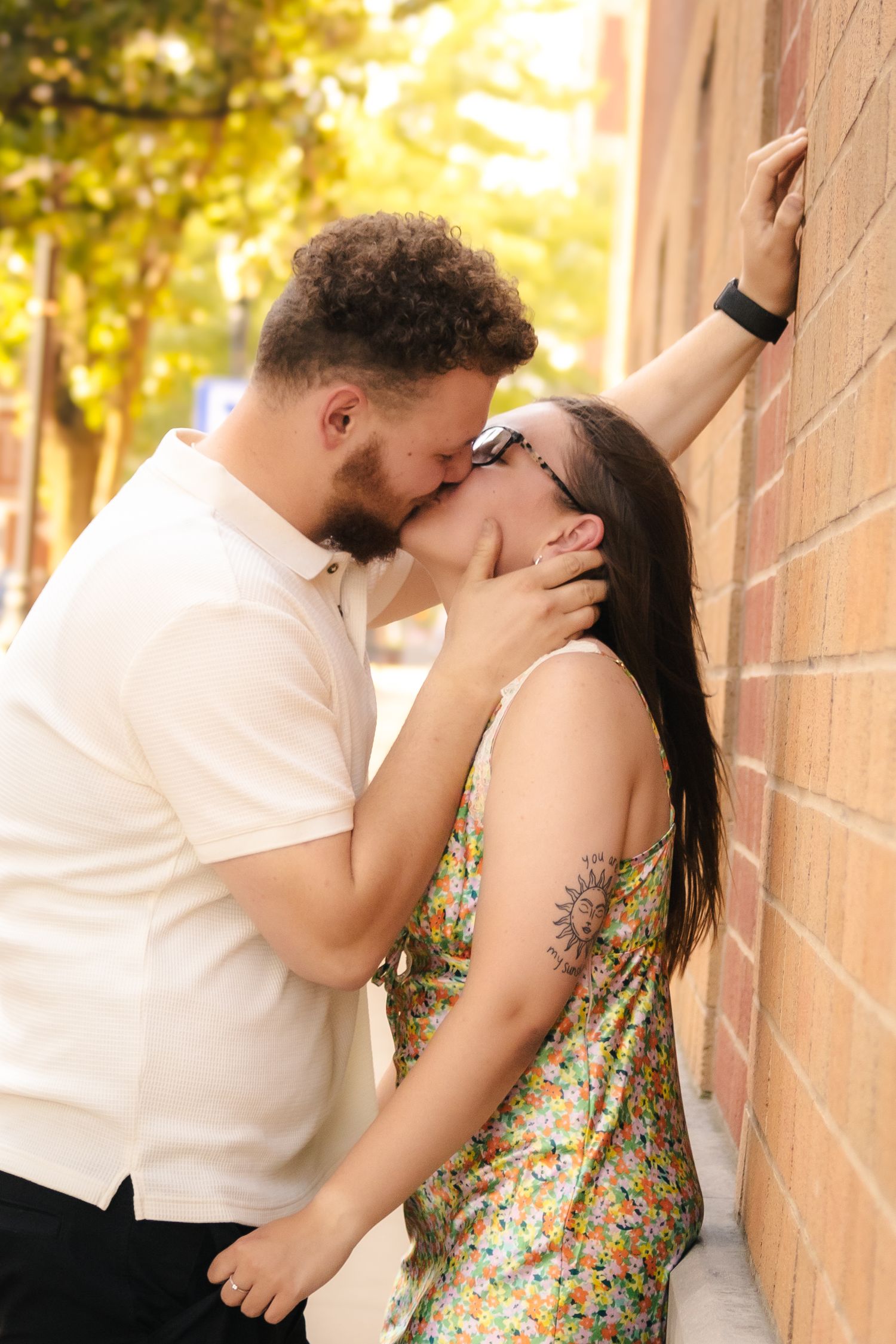 Outdoor summer engagement photos in downtown in Springfield, Illinois