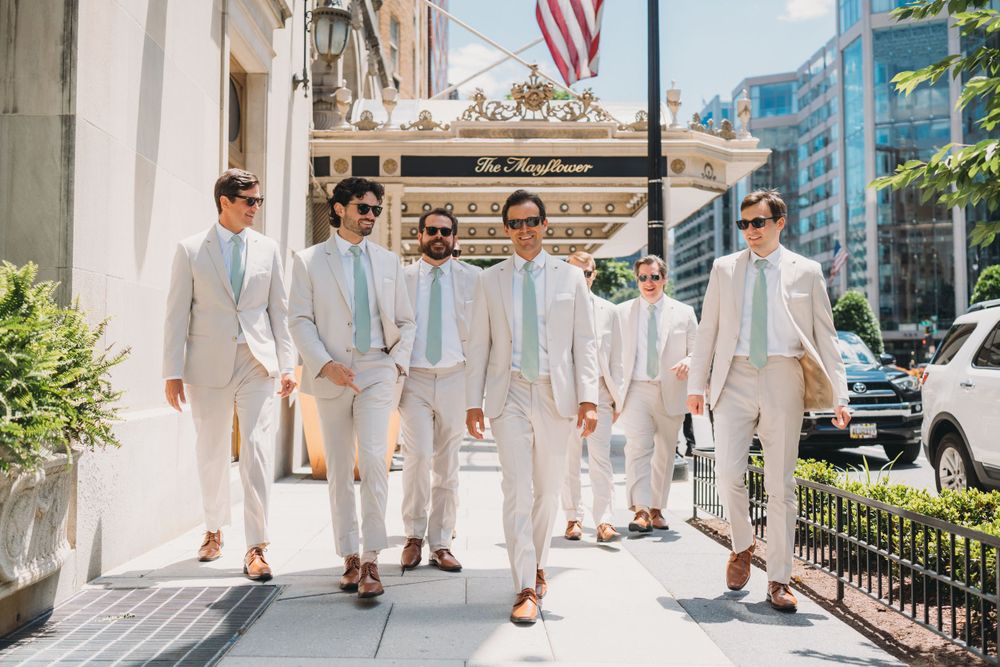 Groomsman exit The Mayflower Hotel, Washington DC Wedding