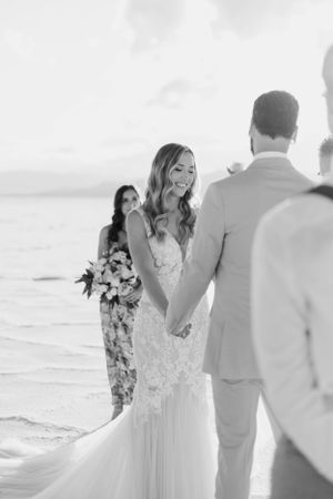 Black and white photo of intimate wedding ceremony on salt flats.