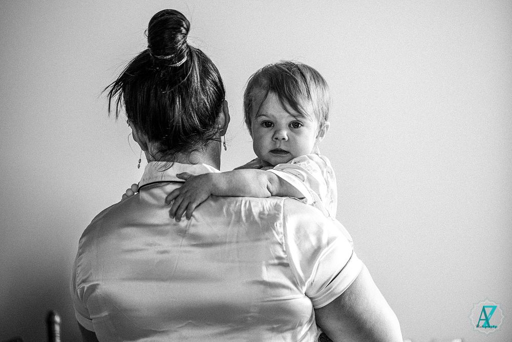 A tender moment captured in black and white showing care and connection.