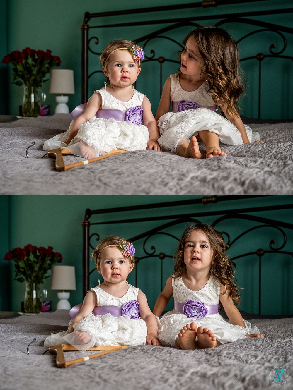 Two flower girls in white and purple dresses sit on a bed with teal wall backdrop.