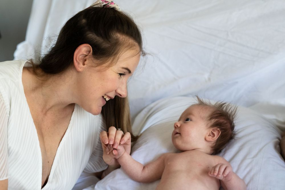 Mother and daughter at a new-born shoot