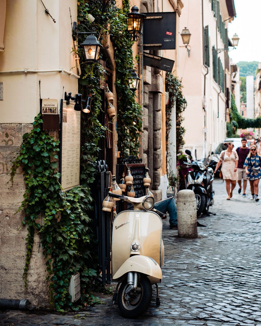 A photo of a Vespa in a photo shoot on the streets of Italy