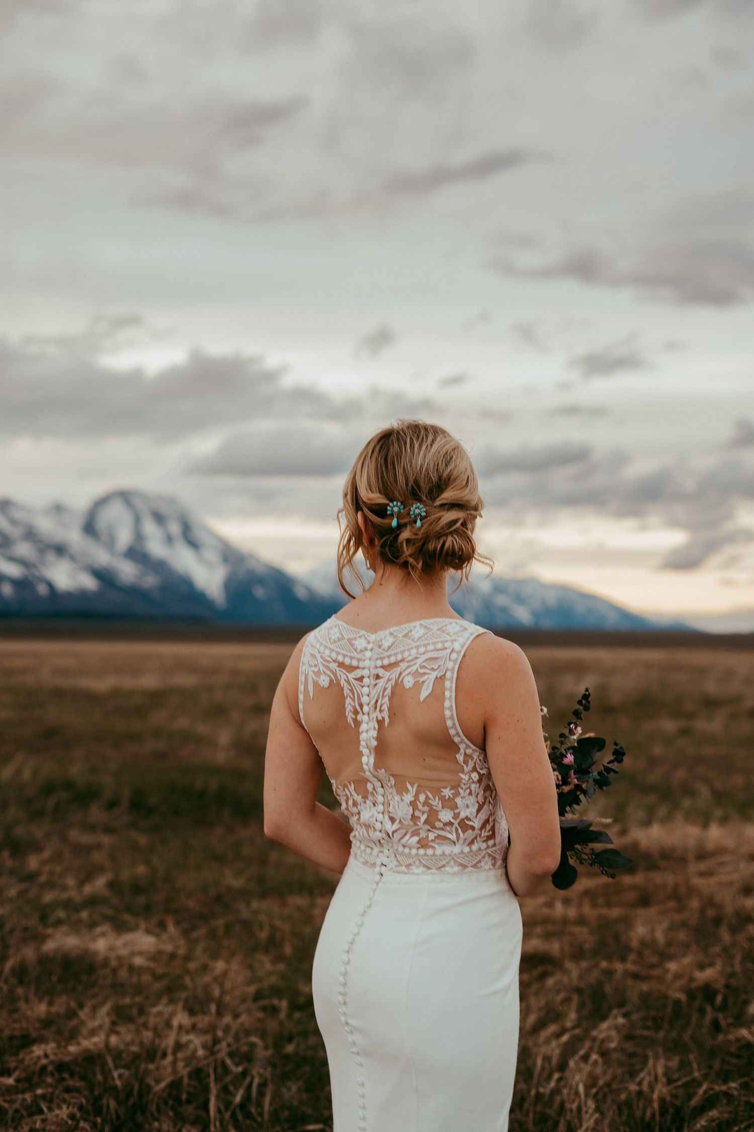 Outdoor wedding ceremony in Wyoming with mountain views and rustic charm
