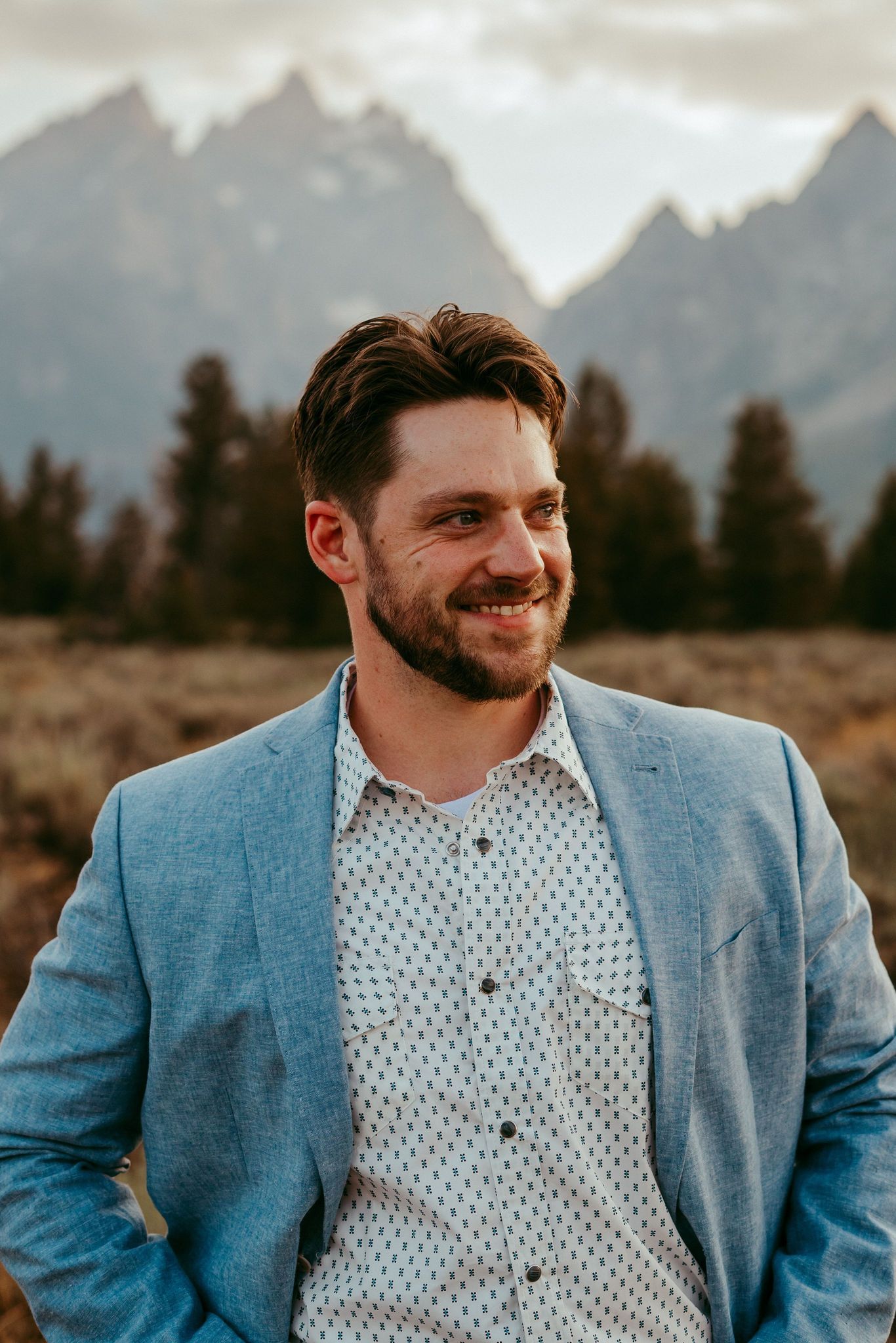 Outdoor wedding ceremony in Wyoming with mountain views and rustic charm