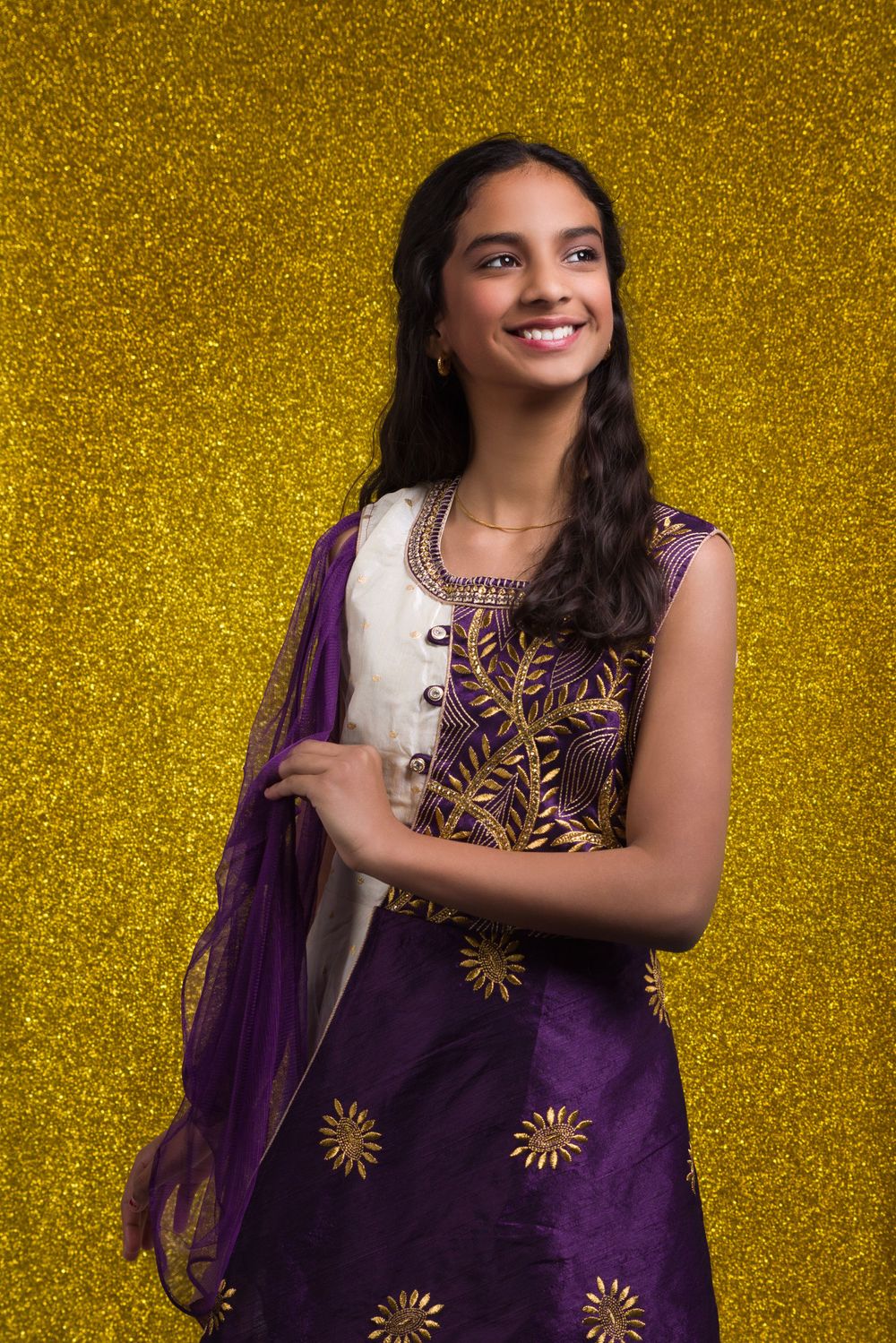photo of young girl in traditional Indian lehenga