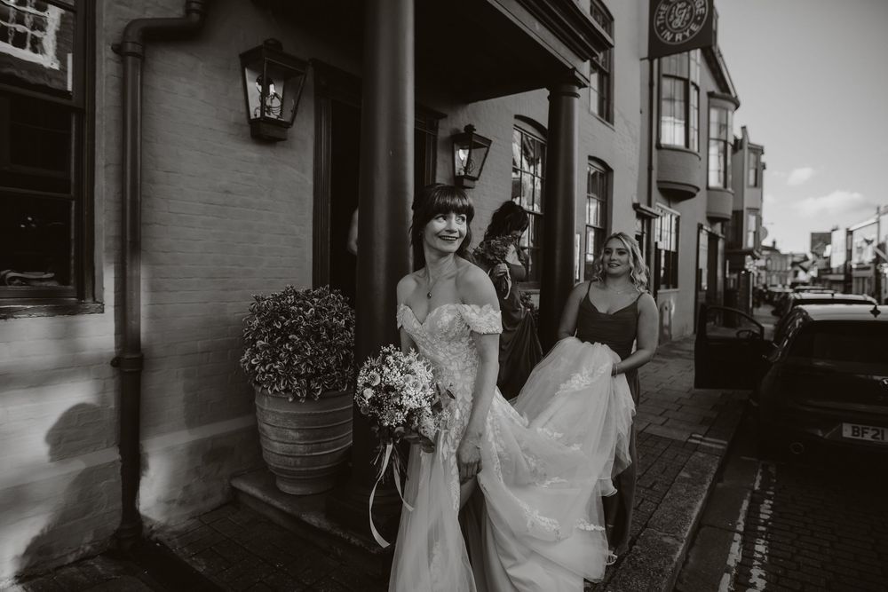 A black and white photo collage of wedding moments showing architectural details. Rye wedding The george