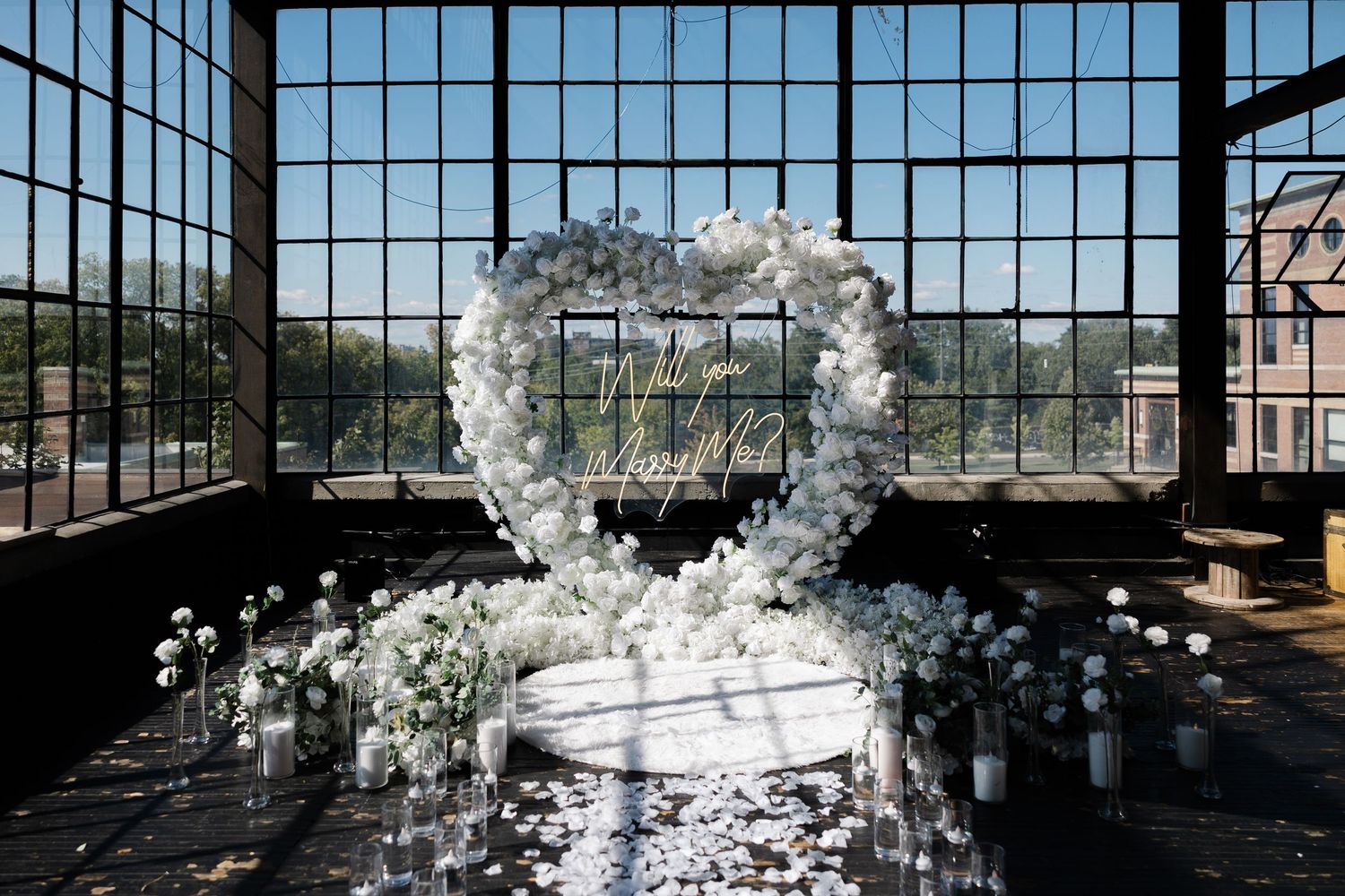 Luxury proposal planner creating romantic engagement decor