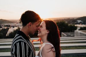 kc engagement photography, man and woman faces in front of sunset
