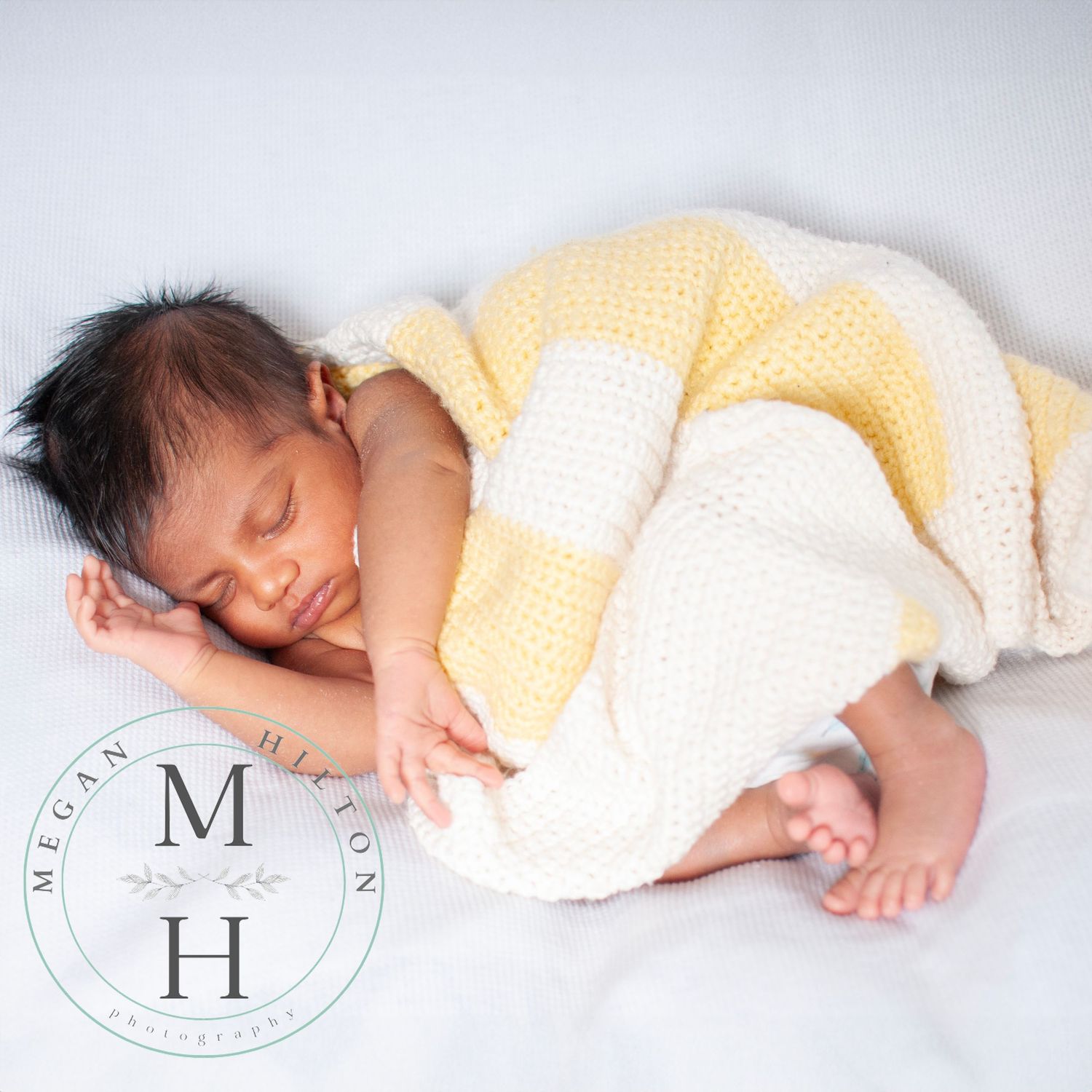 baby newborn photo with crocheted blanket