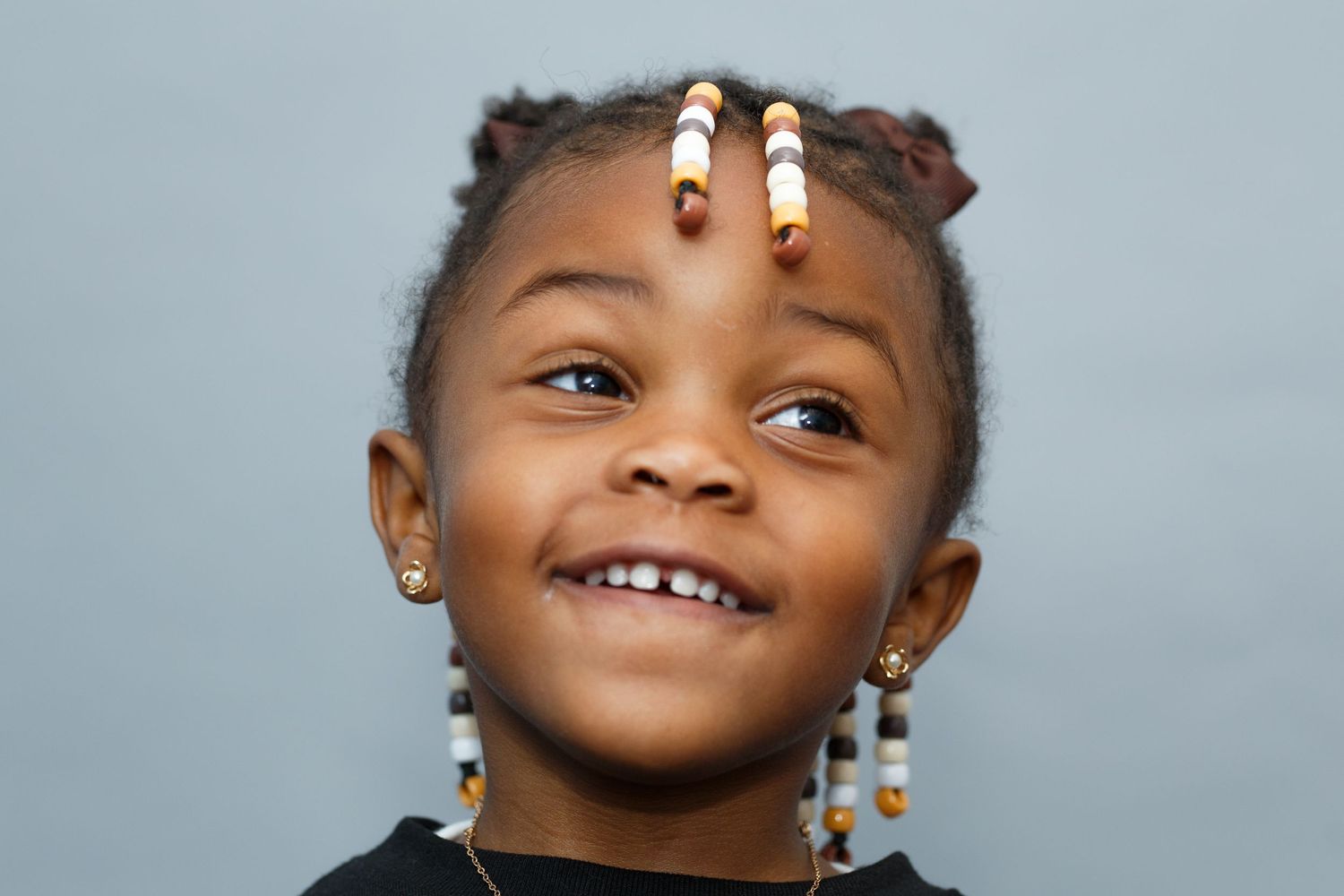 everett school photographer: an african-american preschool girl at a school photography session