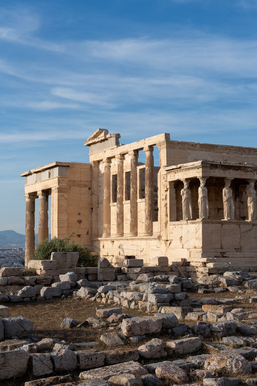 Ancient Erechtheion temple with iconic columns at the Acropolis in Athens.