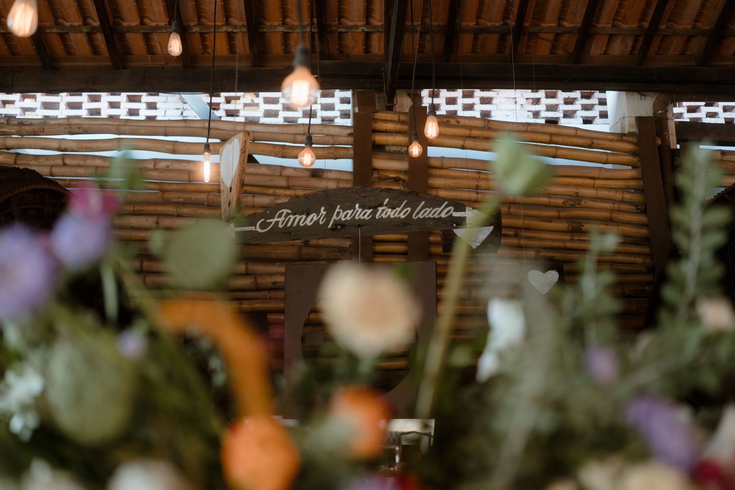 Rustic wedding venue with romantic string lights and floral decor creating a magical atmosphere.