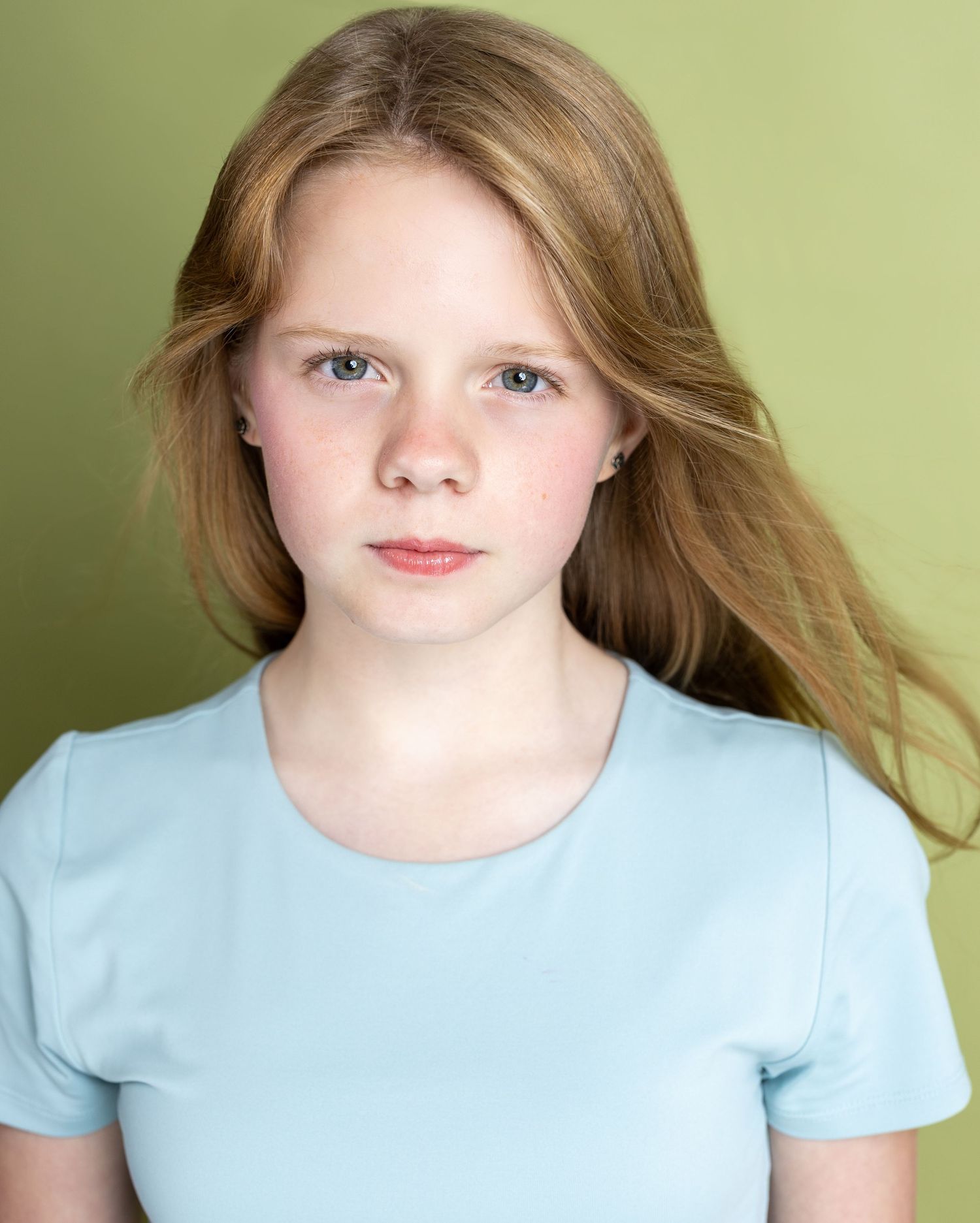 A sequence of headshots featuring someone with long blonde hair wearing a light blue t-shirt.