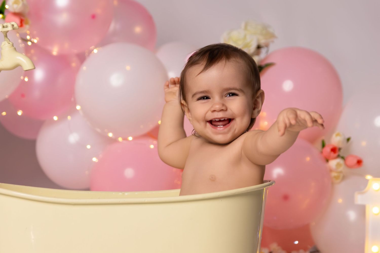 Joyful bath time scene with yellow rubber duck and festive pink balloon backdrop.