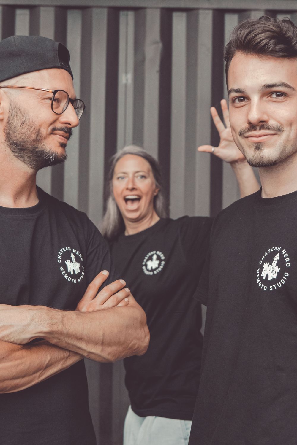 Group of people wearing matching black t-shirts posing together in a series of casual photos.