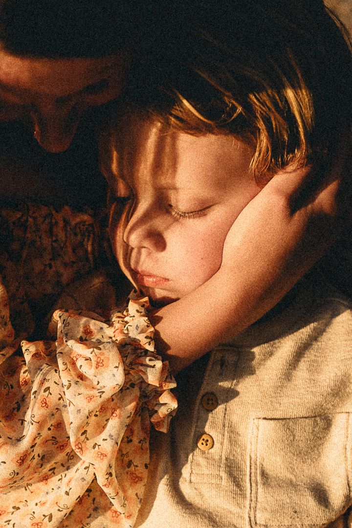 Warm toned portrait in vintage style with ruffled collar detail.