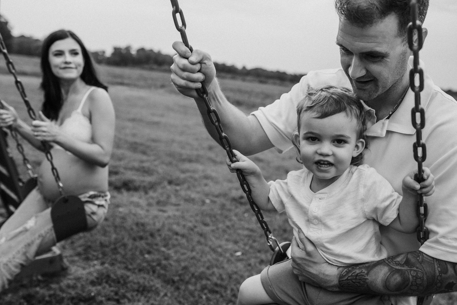 family swinging in backyard is suffolk, virginia maternity photography