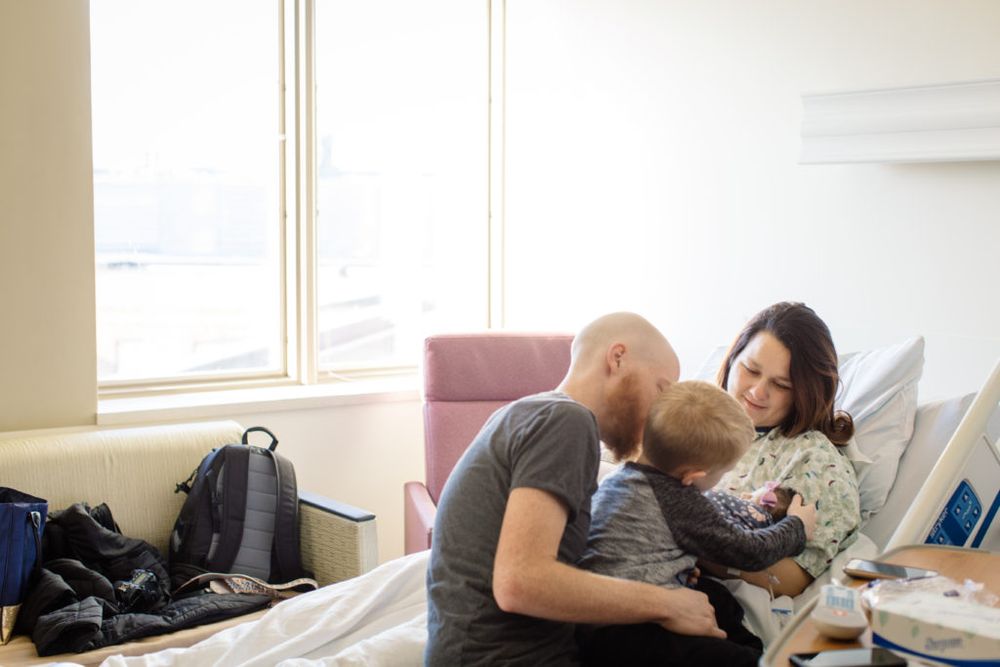 A tender moment in a bright hospital room.