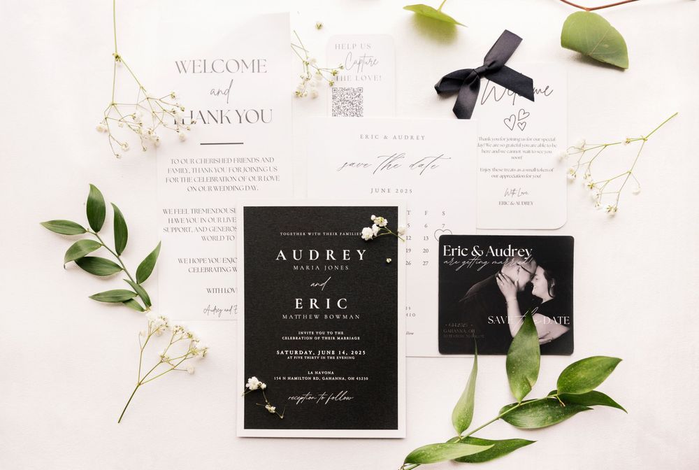 Minimalist wedding invitation suite with greenery and ribbon accents on white background. Columbus, OH Wedding.