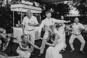 A series of black and white photos showing elderly people exercising and stretching in an outdoor setting.