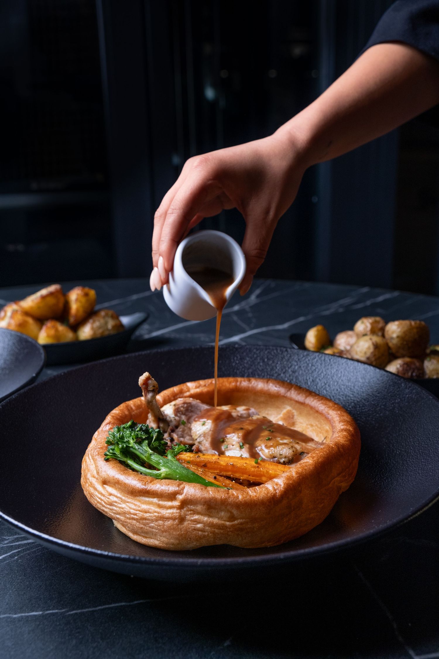 Action shot of gravy pour, Luxury hotel Hyatt regency Birmingham