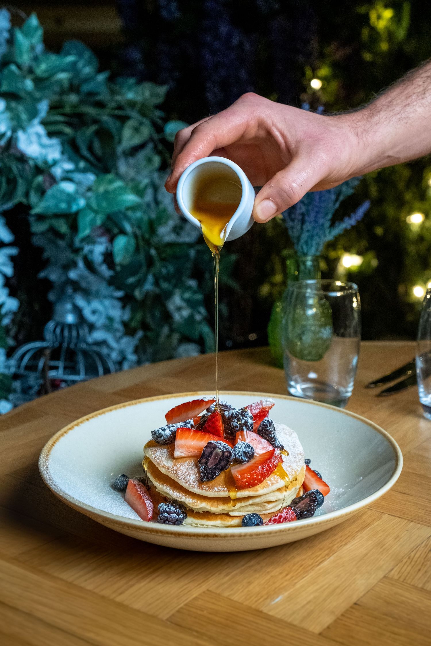 Action shot of syrup pour over pancakes, Luxury hotel Hyatt regency Birmingham