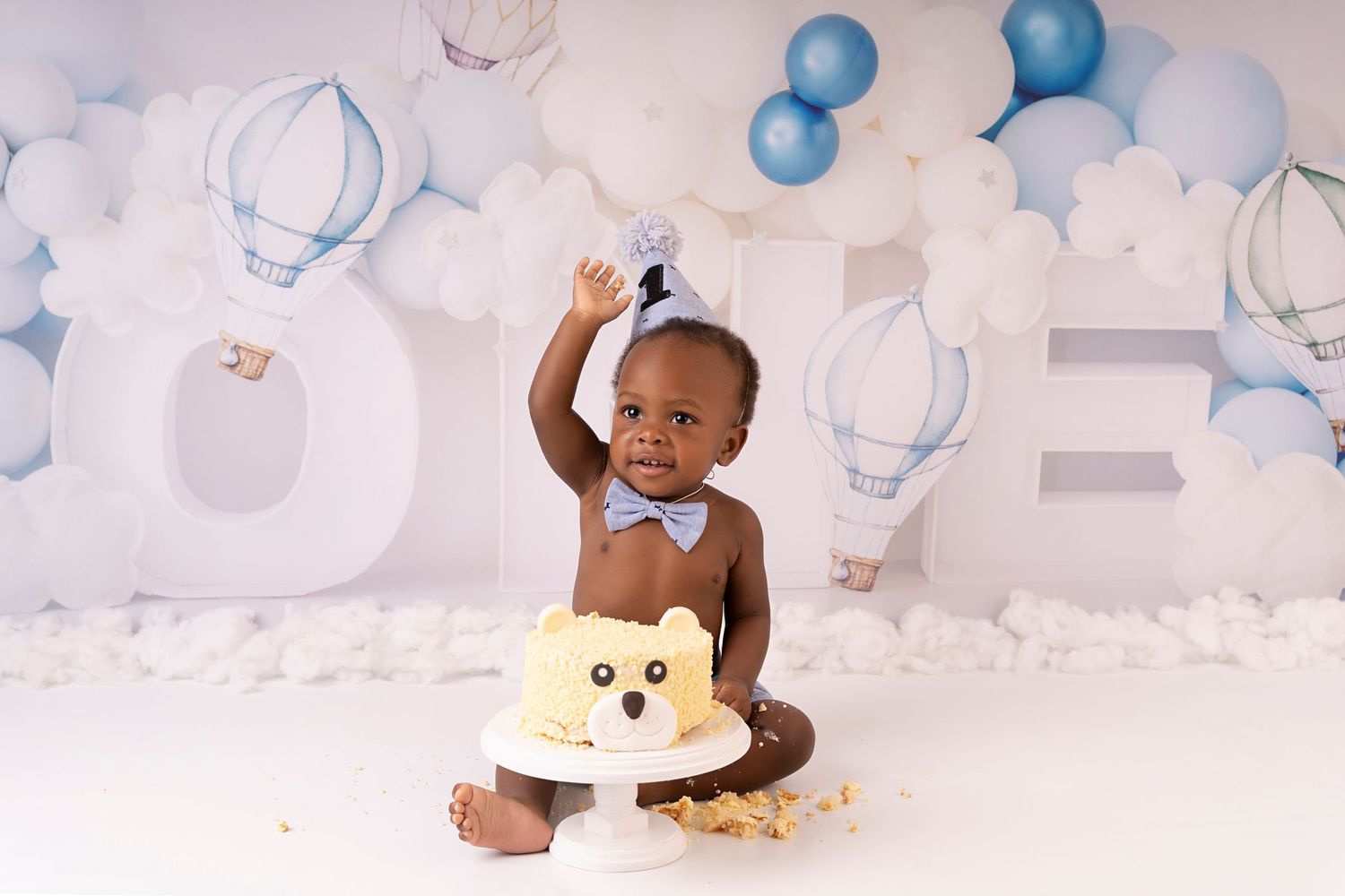 happy to eat and enjoy smiles with a fun filled cake smash