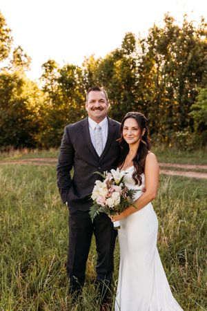 An Elopement Couple poses in a forest in Hamden, CT