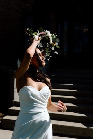 A sequence of artistic bridal portraits showing a woman in a white dress standing in dramatic sunlight and shadows.