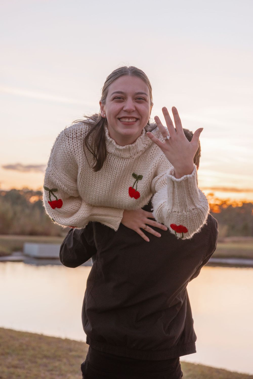 Surprise proposal moment with couple celebrating at Canopy Oaks in Lakeland Florida