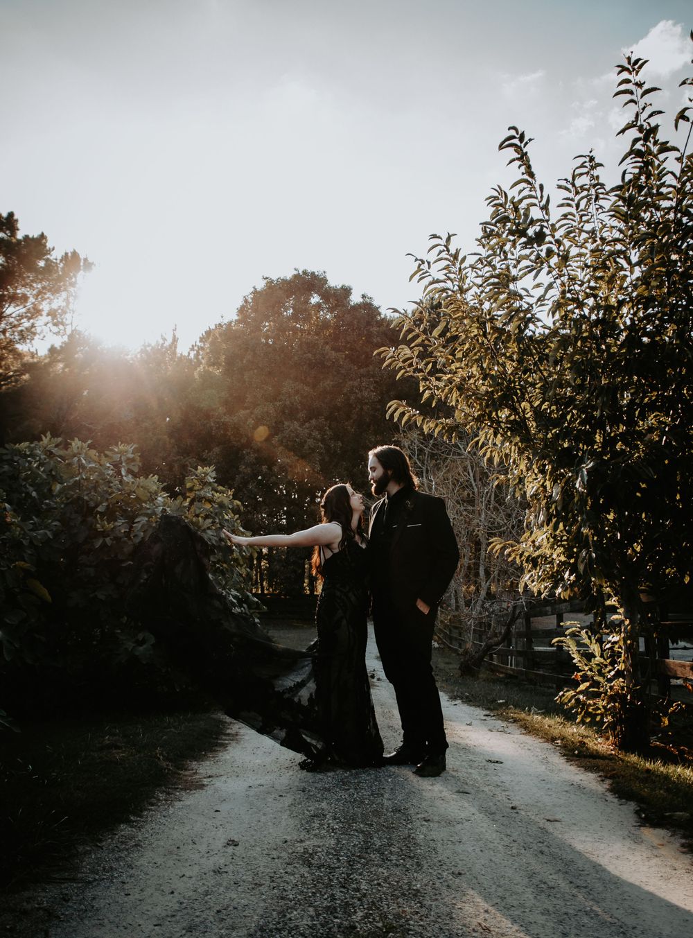 Loving couple sharing a tender moment, captured in a natural and romantic setting during a photo session