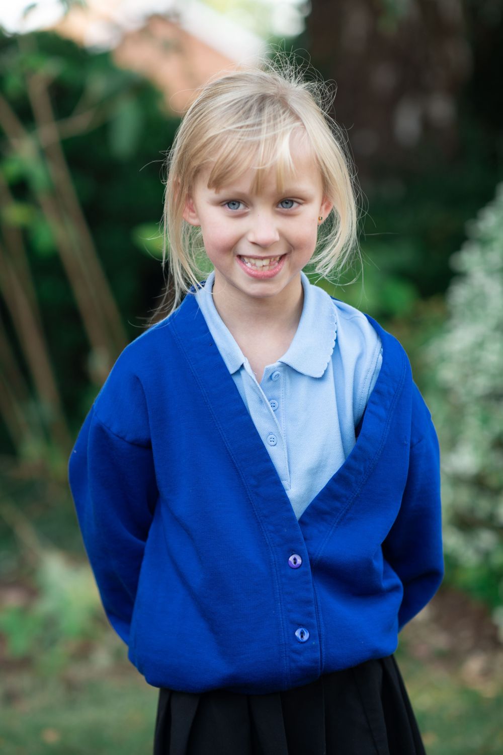 School girl smiling naturally in a school photograph in North Yorkshire.
