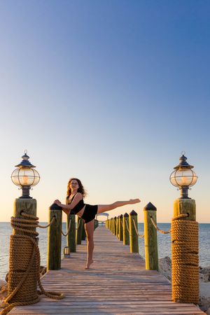 Dance photoshoot at Westport beach featuring flowing movement, ocean backdrop and golden hour lighting