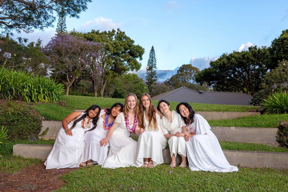 Maui high school senior besties photo at Seabury Hall Makawao with Haleakala in the background