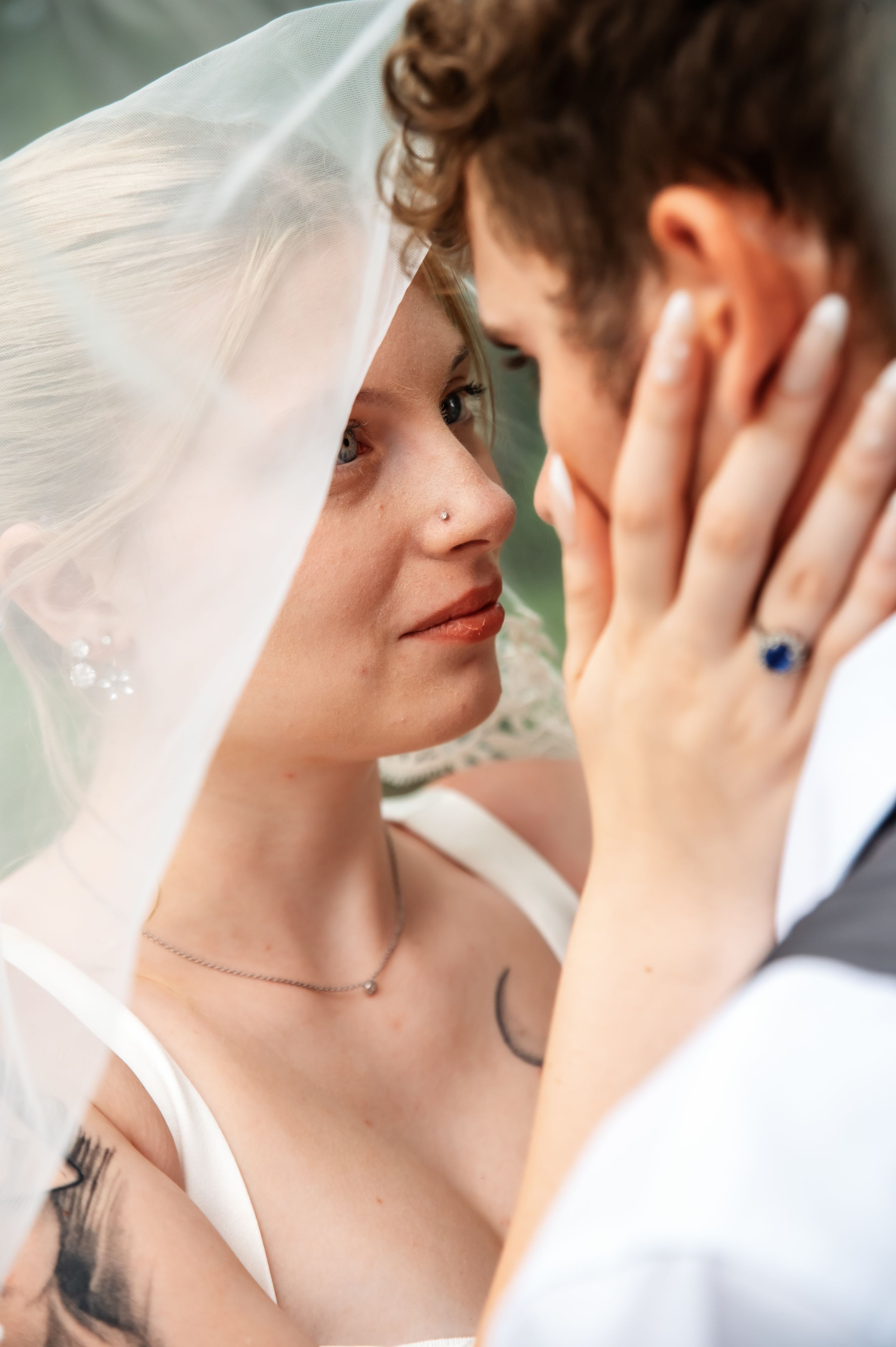 Newlywed couple embracing during their wedding photography session in Lima, Ohio