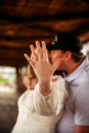 couple showing engagement ring in St. Marys, Ohio