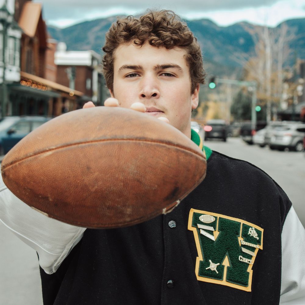 A sequence of photos featuring a football against a mountain backdrop with snowy peaks in the distance.