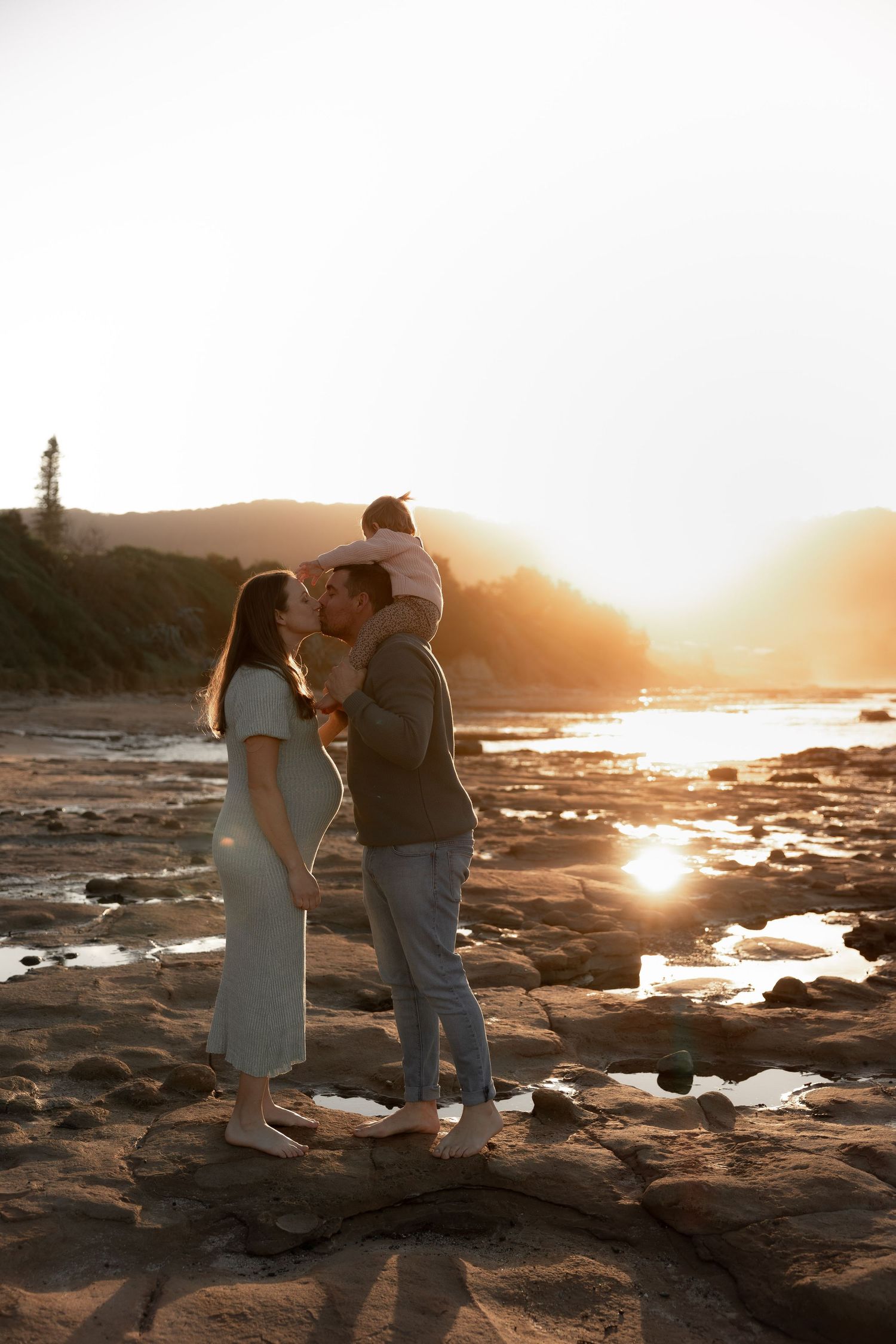 Maternity family photoshoot at sunset with pregnant mum, toddler, and husband in Bulli - family photography in Woonona and Illawarra.