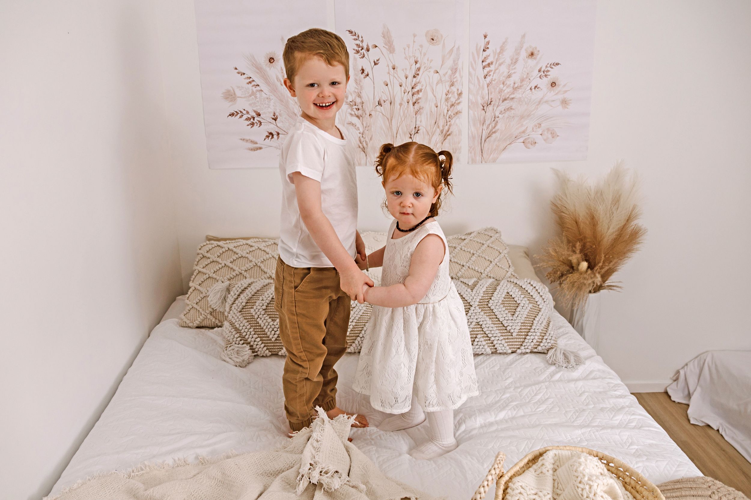 siblings at lifestyle newborn photography session