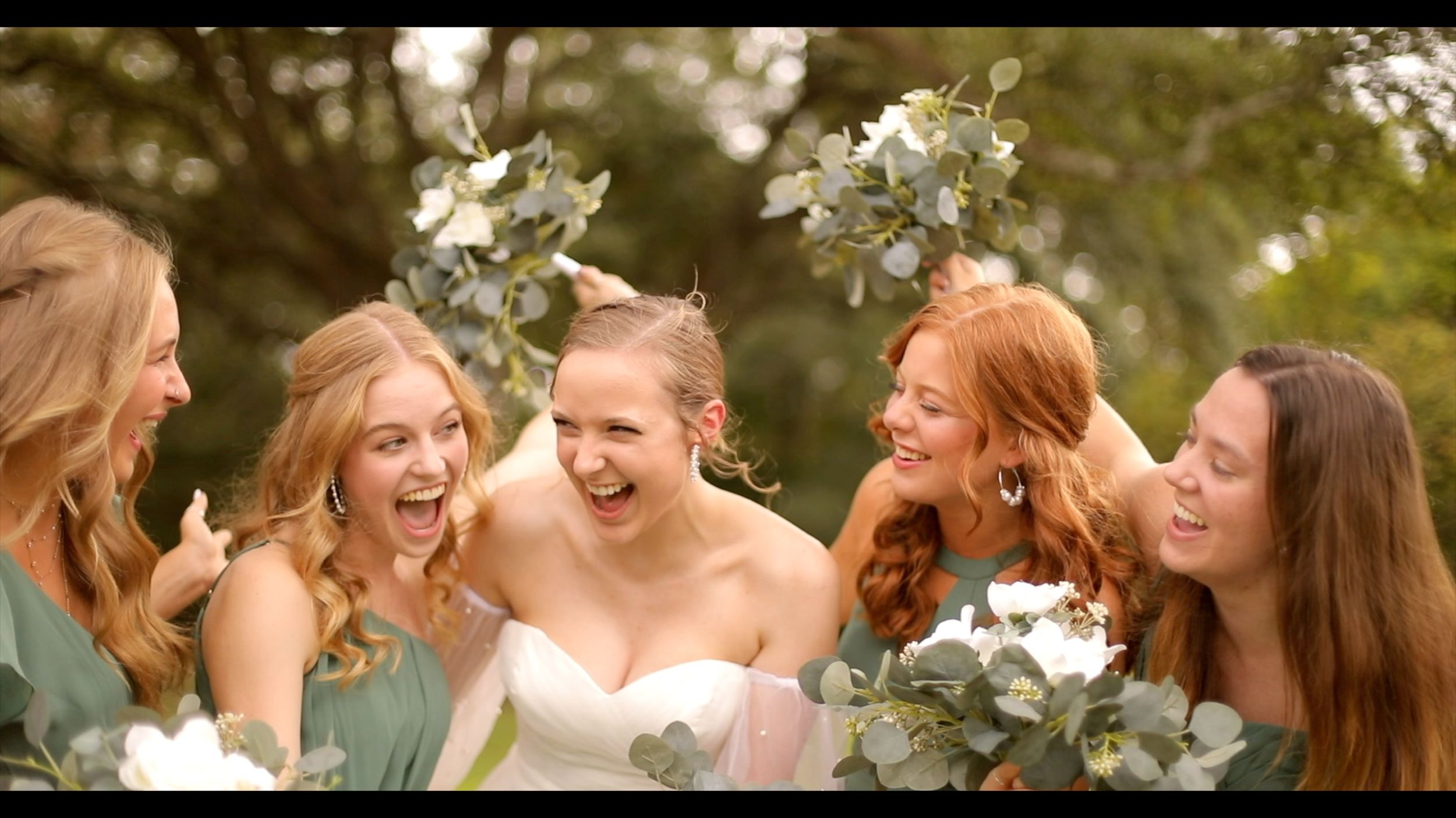 Close up Bride and Bridesmaids Laughing Playful Candid