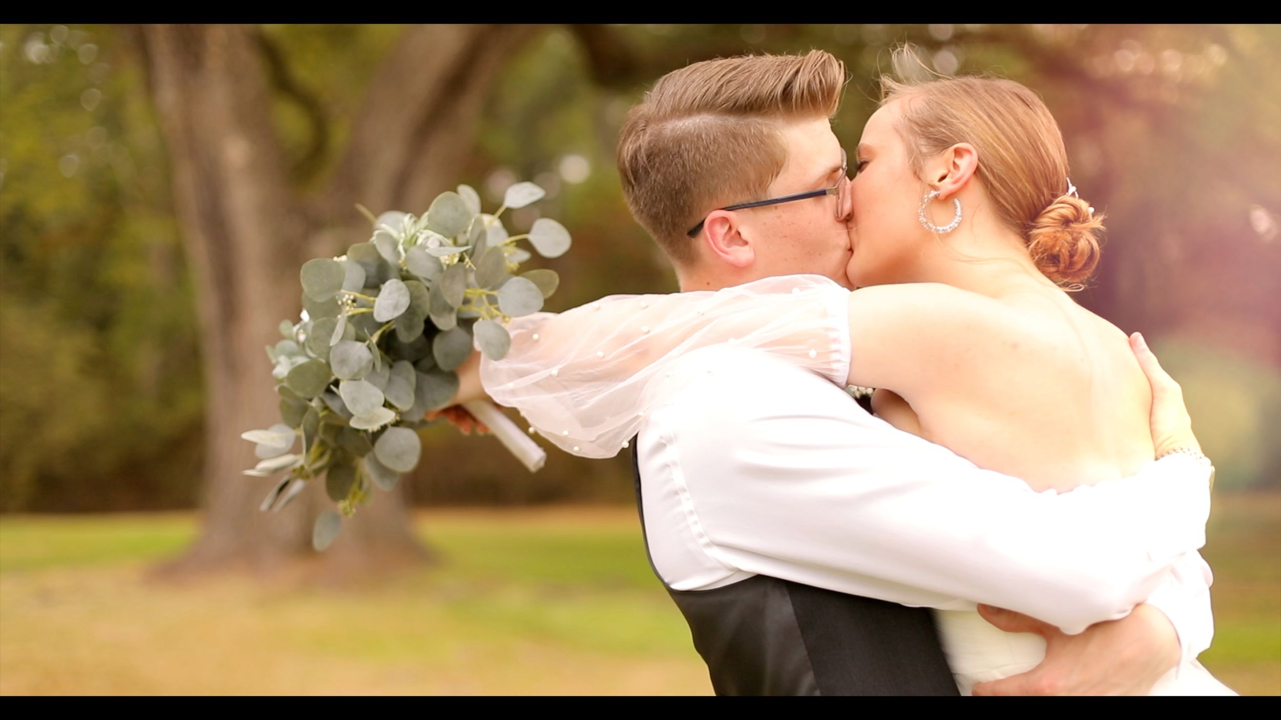 Romantic Magical Bride and Groom Kissing Outdoor Sunset