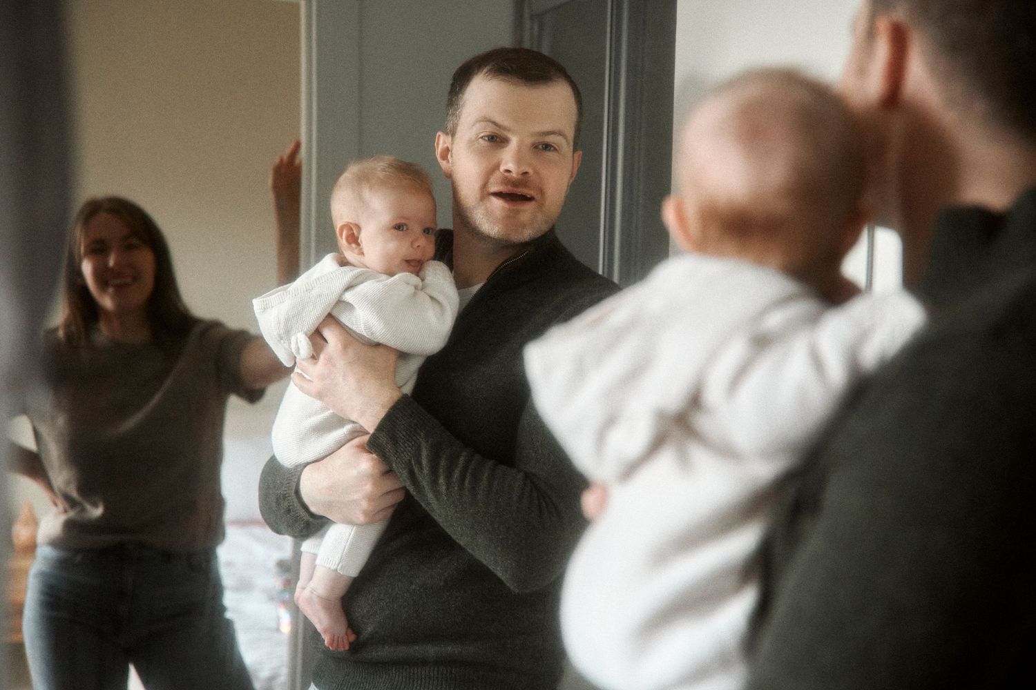 family portrait at home with baby
