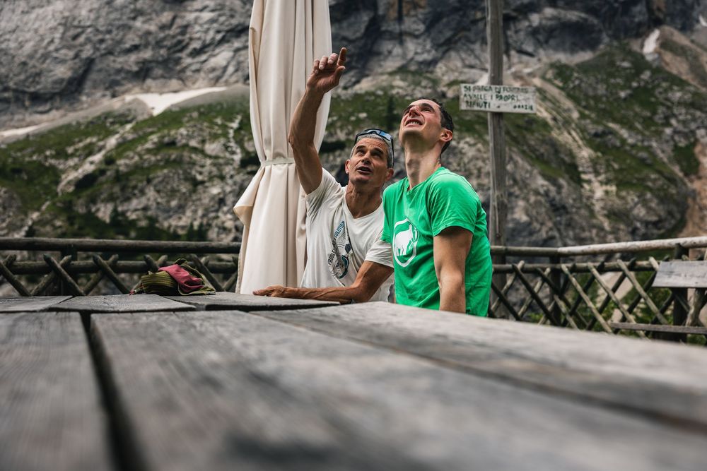 Adam Ondra and Pietro dal Pra looking at the South Face of Marmolada the day before climbing the Fish route. Photo: Jan Virt