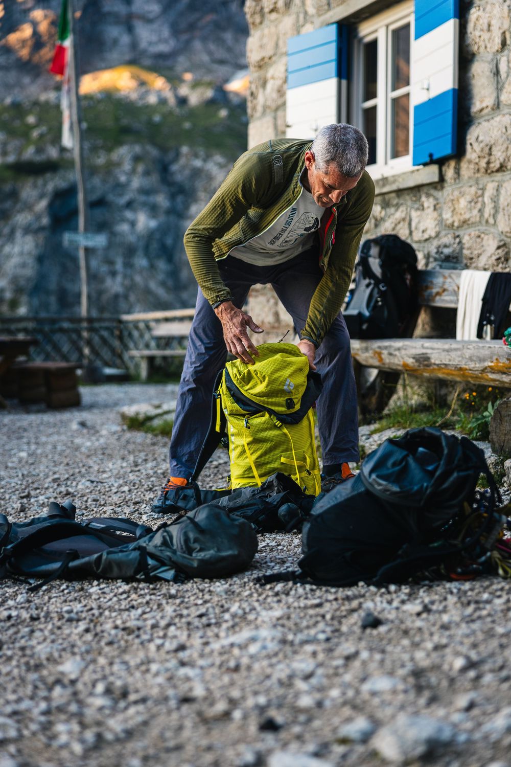 Pietro dal Pra preparing gear the day before climbing the Fish route on Marmolada, Dolomites, Italy. Photo: Jan Virt