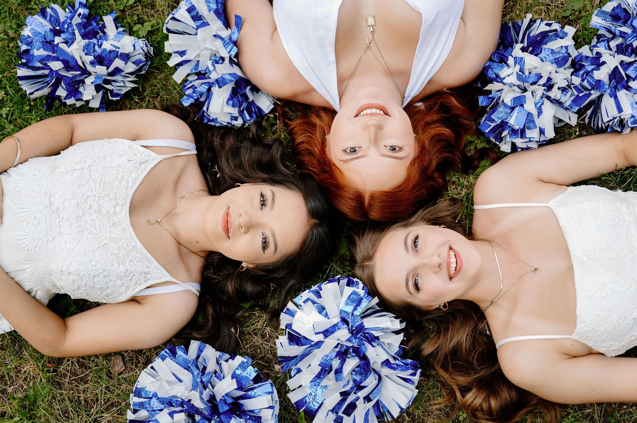 Walla Walla High School dance team photoshoot with blue and white pom poms and white dresses