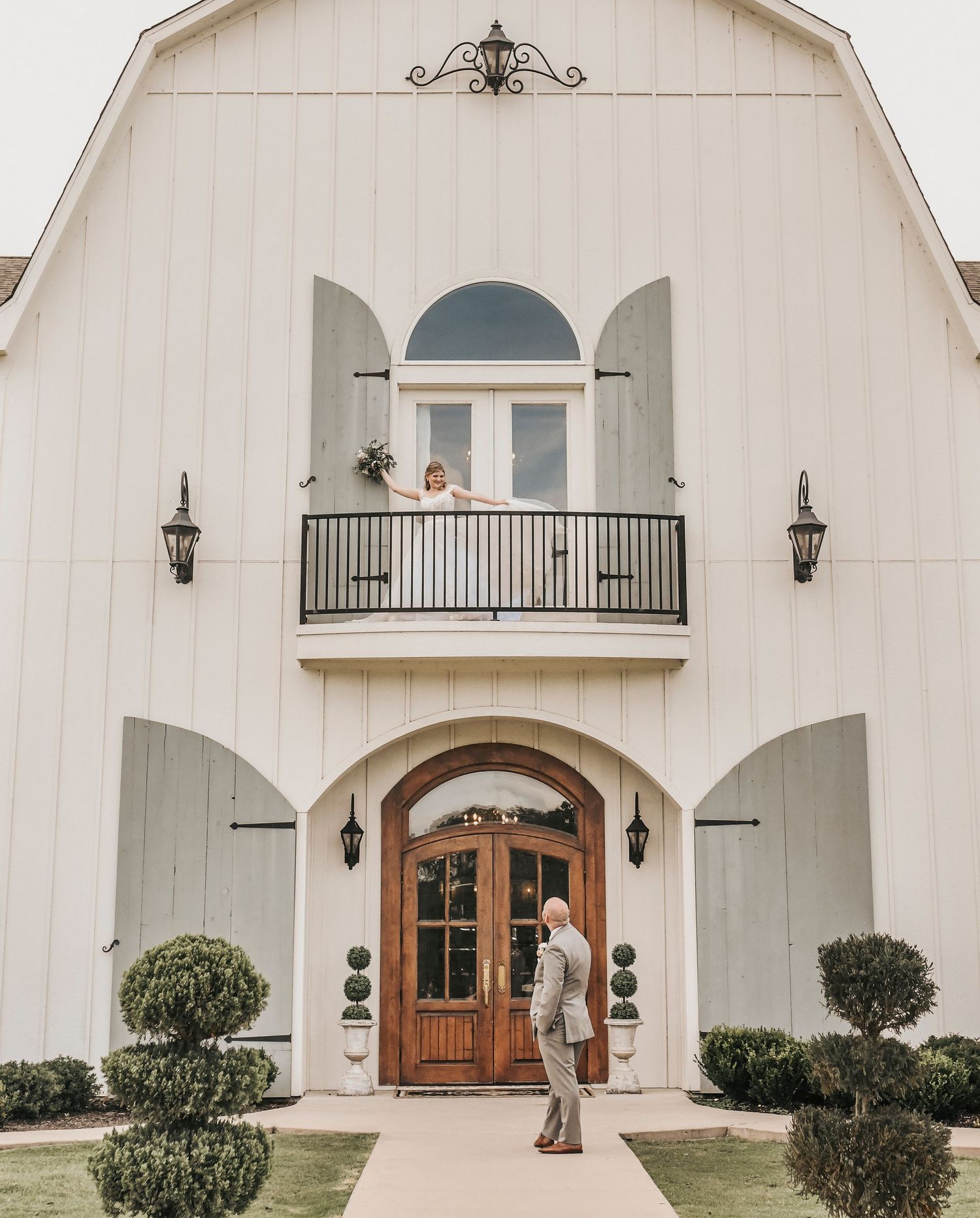 Romantic North Texas wedding photography featuring newlyweds outside the venue