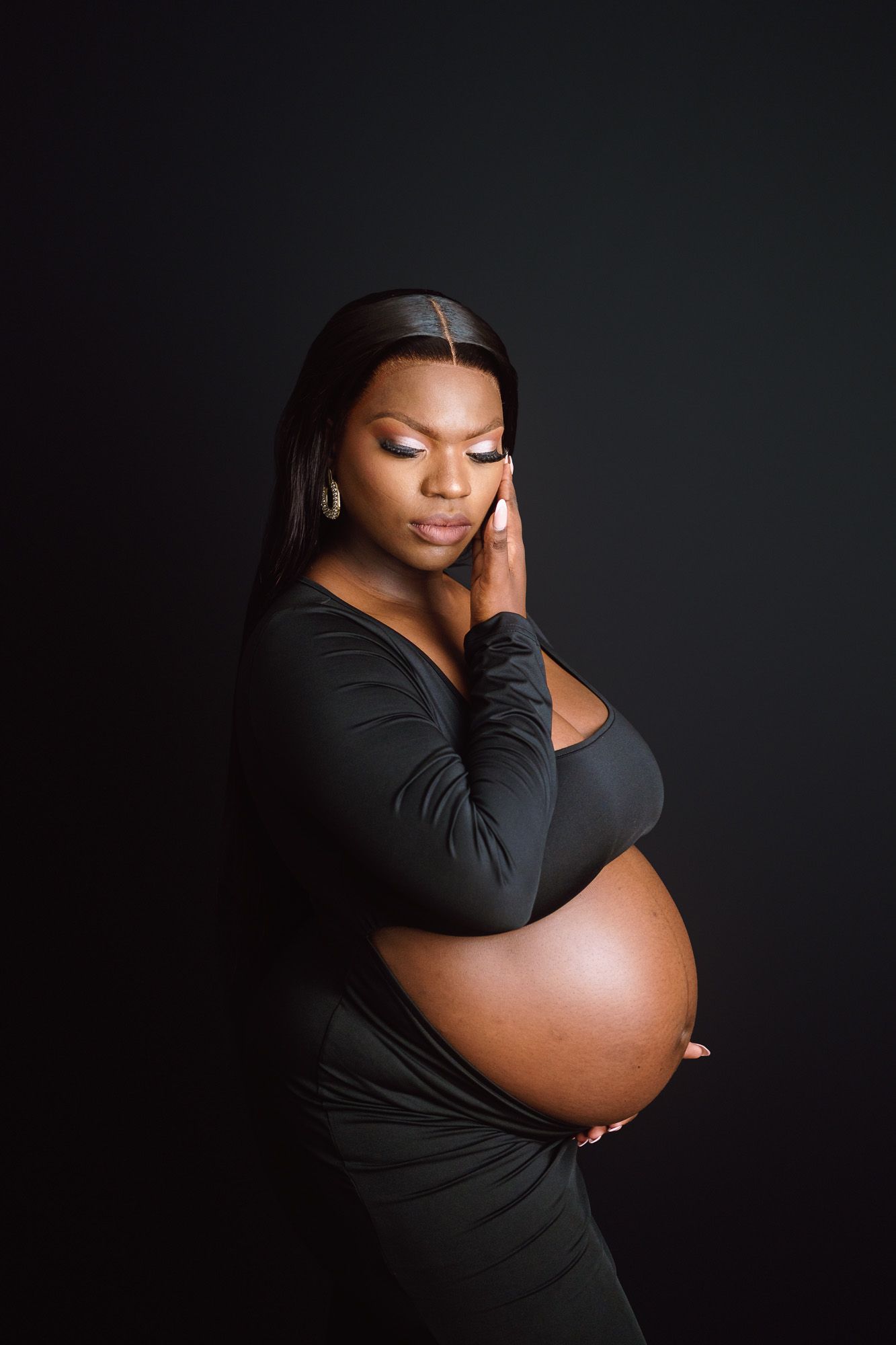 Beautiful pregnancy portrait of expecting mother preparing to welcome her baby boy