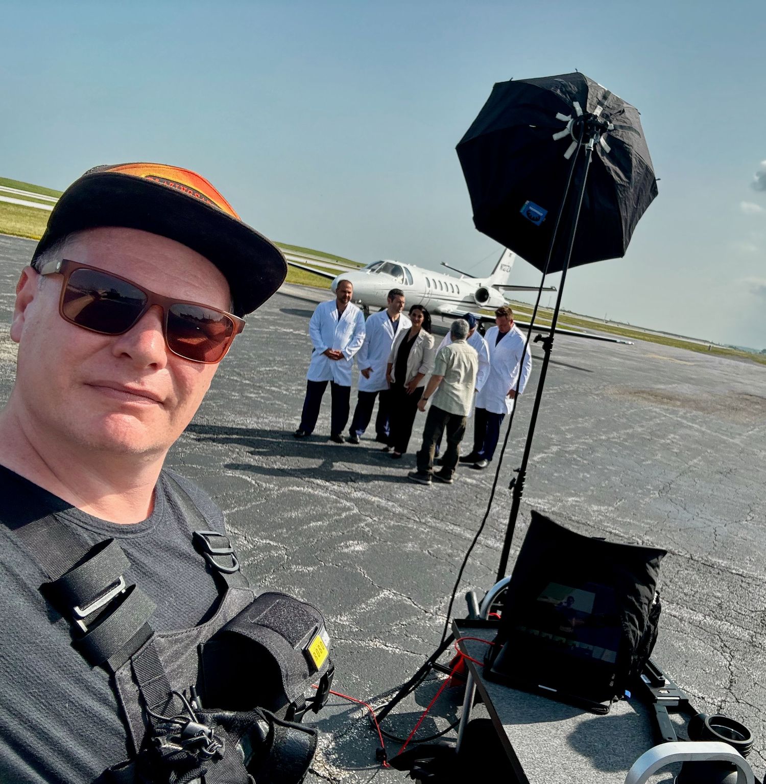 Behind the scenes at Burke Airport photo assistant  for Roger Mastroianni with Magliner, Macook Pro, Profoto lighting, Sony A7Riv